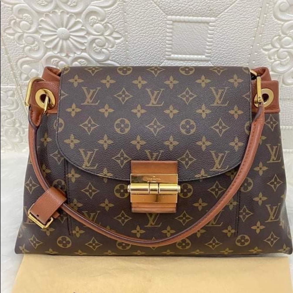 Authentic louis vuitton OLYMPE handbag